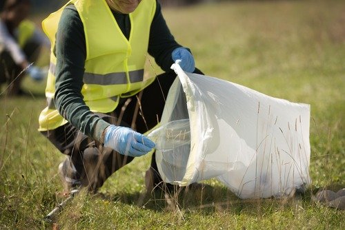 people-doing-community-service-by-collecting-trash (1)